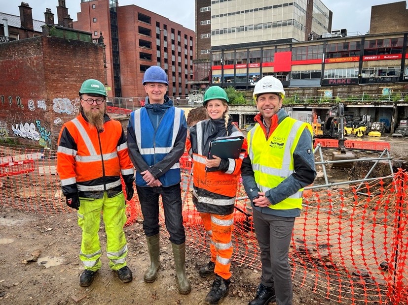 Cllr Ben Miskell with Castlegate representatives at the site on a cloudy day