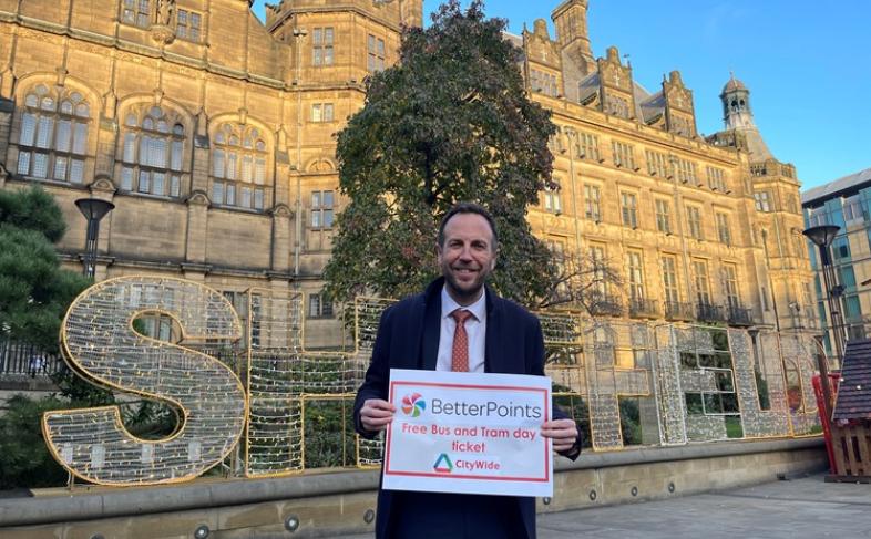 Cllr Ben Miskell stood in the Peace Gardens with the Town Hall behind him. It is a sunny day