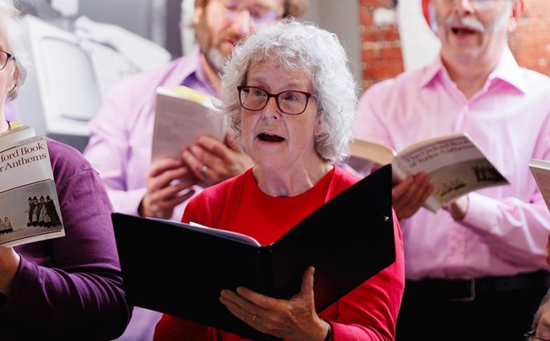 A group of people singing from the Oxford Book of Tudor Anthems.Credit James Stanthorpe