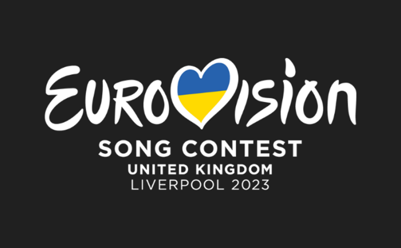 The main logo for Eurovision with a flag for Ukraine entered into the V which has been transformed into a heart.