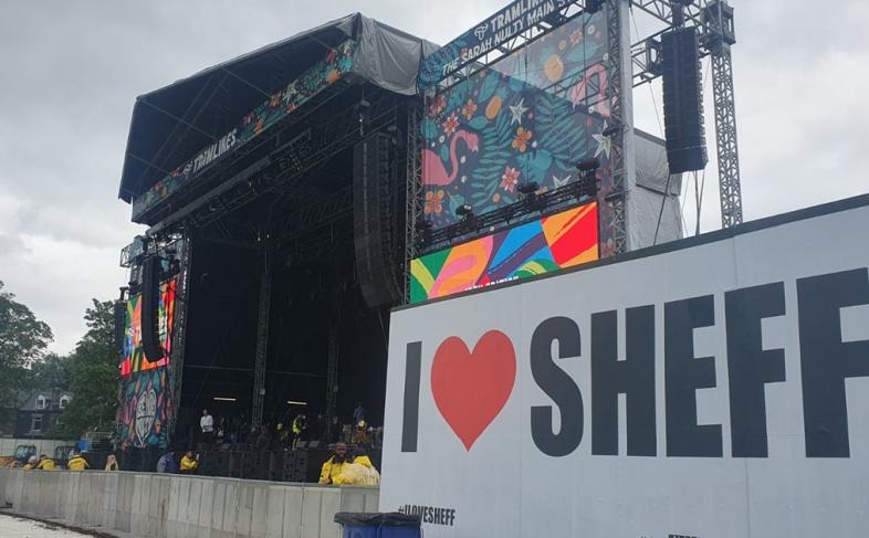 Tramlines main stage in Hillsborough Park. A sign says I heart Sheff.