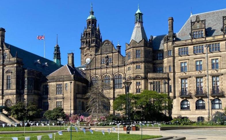 Sheffield Town Hall underneath a clear blue sky on a beautiful sunny day