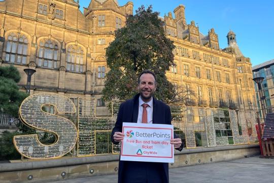 Cllr Ben Miskell stood in the Peace Gardens with the Town Hall behind him. It is a sunny day