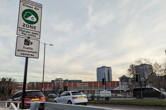 Clean Air Zone sign with traffic in the background