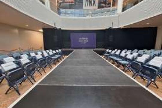 A large room featuring a catwalk.