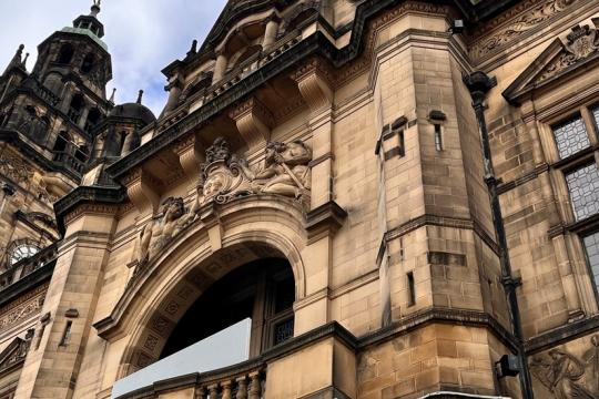 image of the Town Hall balcony and the leaded windows at the front of the Town Hall