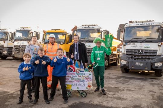 John Kirk, winter maintenance manager at Amey, Councillor Joe Otten, chair of Sheffield City Council's Waste and Street Scene Policy committee and charity fundraise John Burkhill with local children who helped name the Streets Ahead gritters