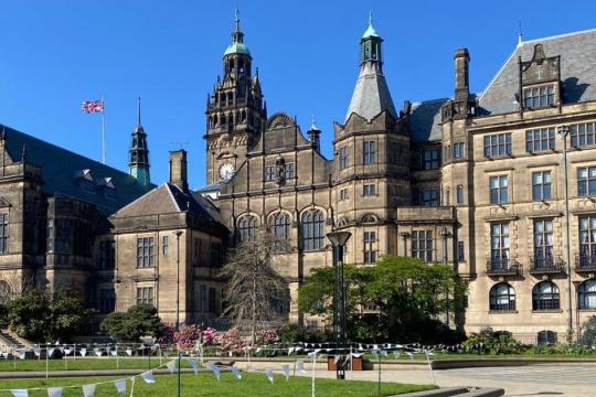 Sheffield Town Hall underneath a clear blue sky on a beautiful sunny day